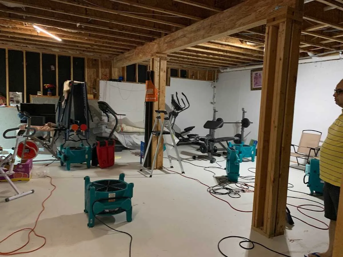 Basement drying equipment setup for Contents Cleaning & Restoration in Estherville